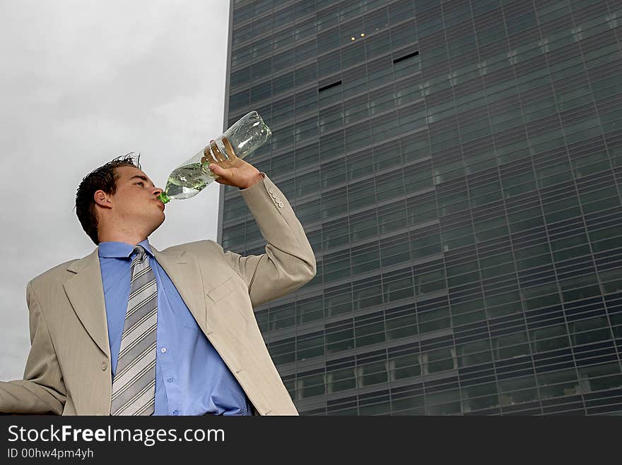 Businessman drinking water