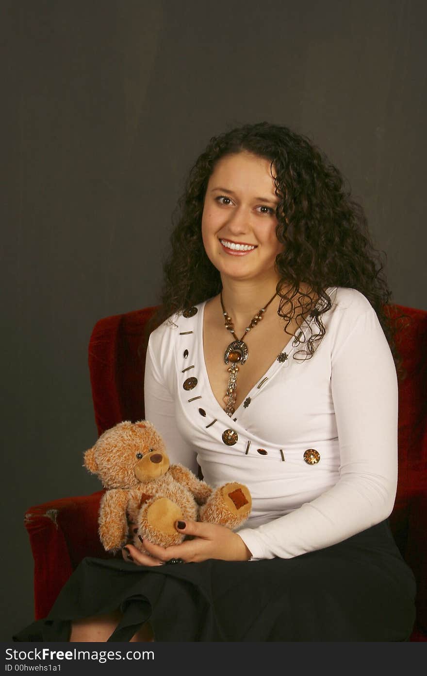 Smiling girl with little bear. Smiling girl with little bear