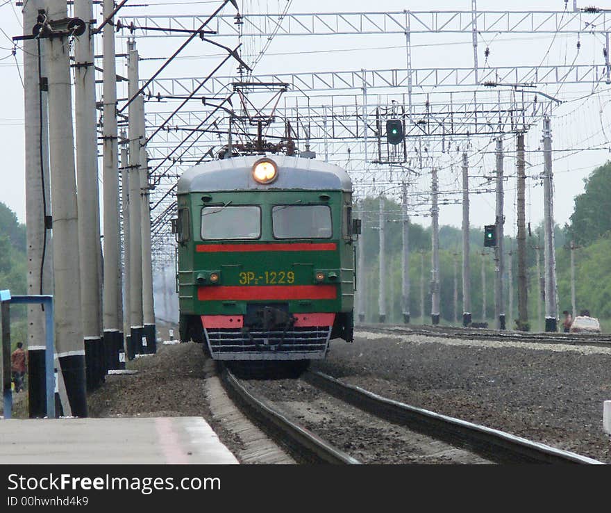 The electric train arrives on railway station