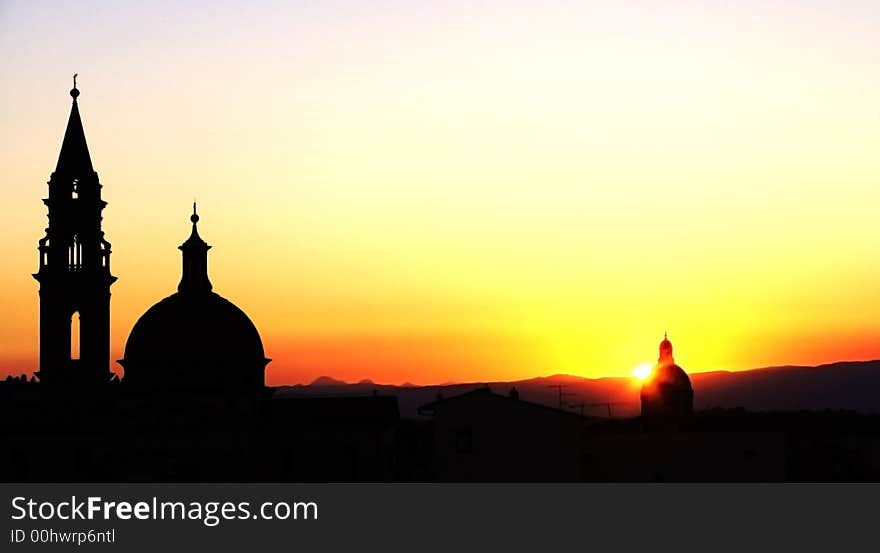 Strong silhouette of cathedral against setting sun. Strong silhouette of cathedral against setting sun