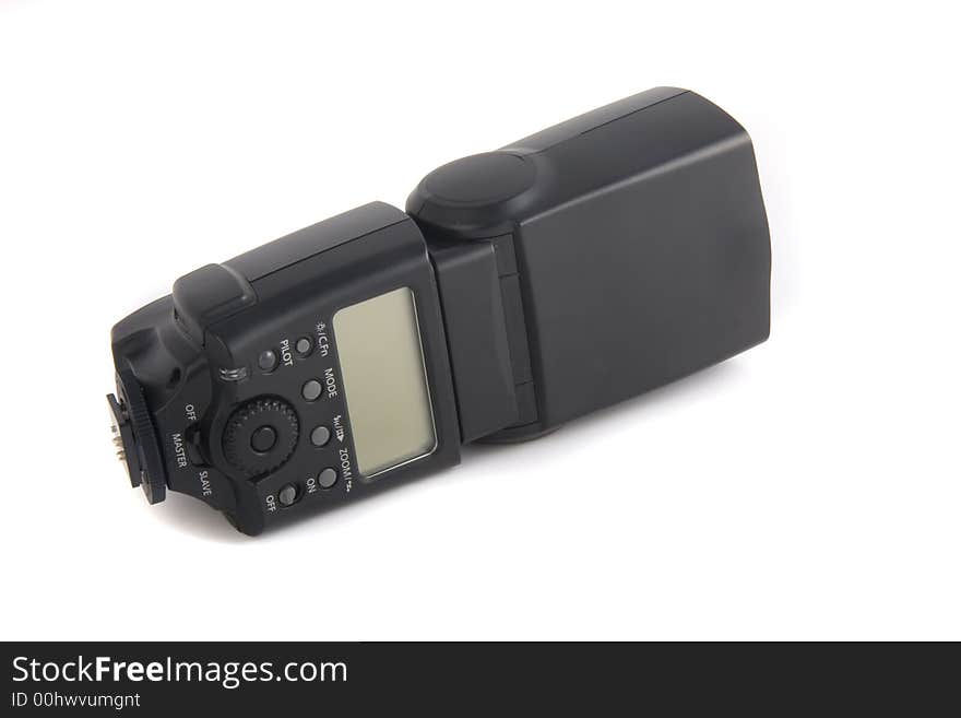 Photo of the camera flashgun isolated on the white background; photo 2 of 3. Photo of the camera flashgun isolated on the white background; photo 2 of 3