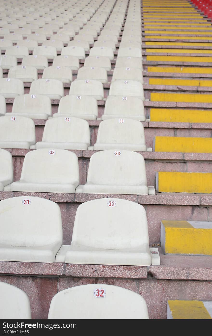 White stadion chairs in europe,Stadium seats
A field of empty stadium seats.