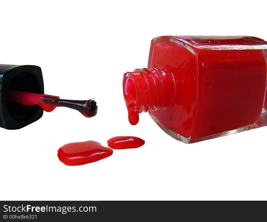 A bottle of red nailpolish dripping, isolated on white. A bottle of red nailpolish dripping, isolated on white