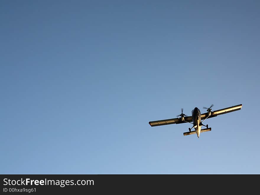 Airplane in the blue sky