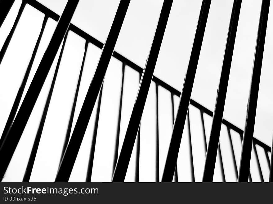 An abstract photograph of a silhouetted railing. Suitable as backgound. An abstract photograph of a silhouetted railing. Suitable as backgound