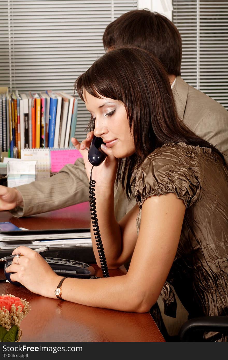 Group of business people working together in the office. Group of business people working together in the office.