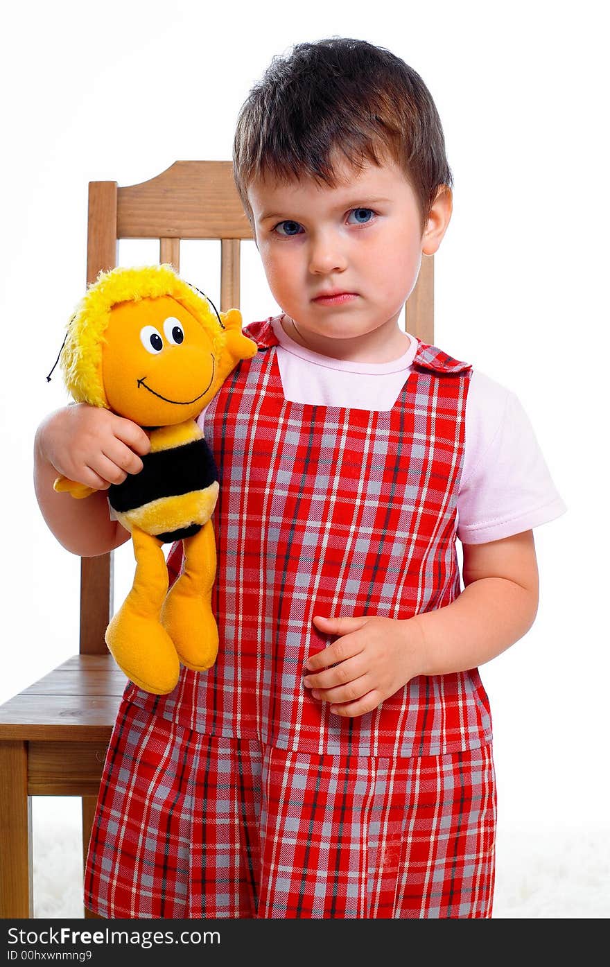 Portrait of little girl with toy