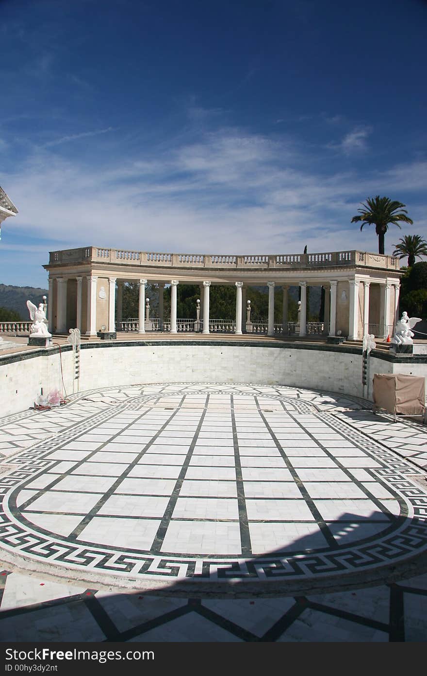 A large empty roman marble pool. A large empty roman marble pool