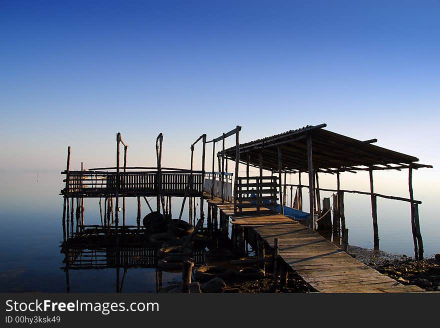 Tranquil scene with custom fishing boat anchorage