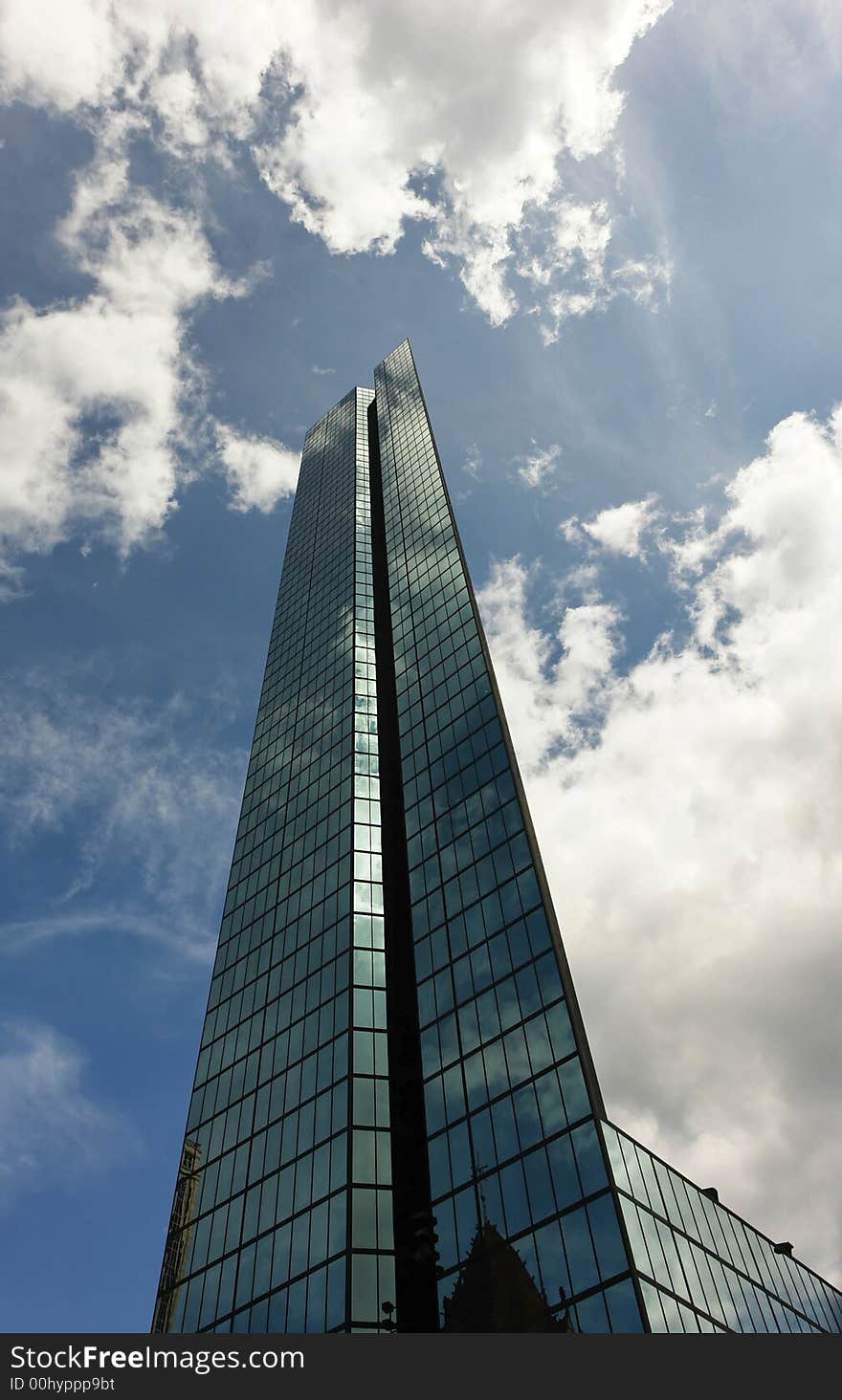 Hancock Back Bay skyscraper reaching to the sky. Hancock Back Bay skyscraper reaching to the sky