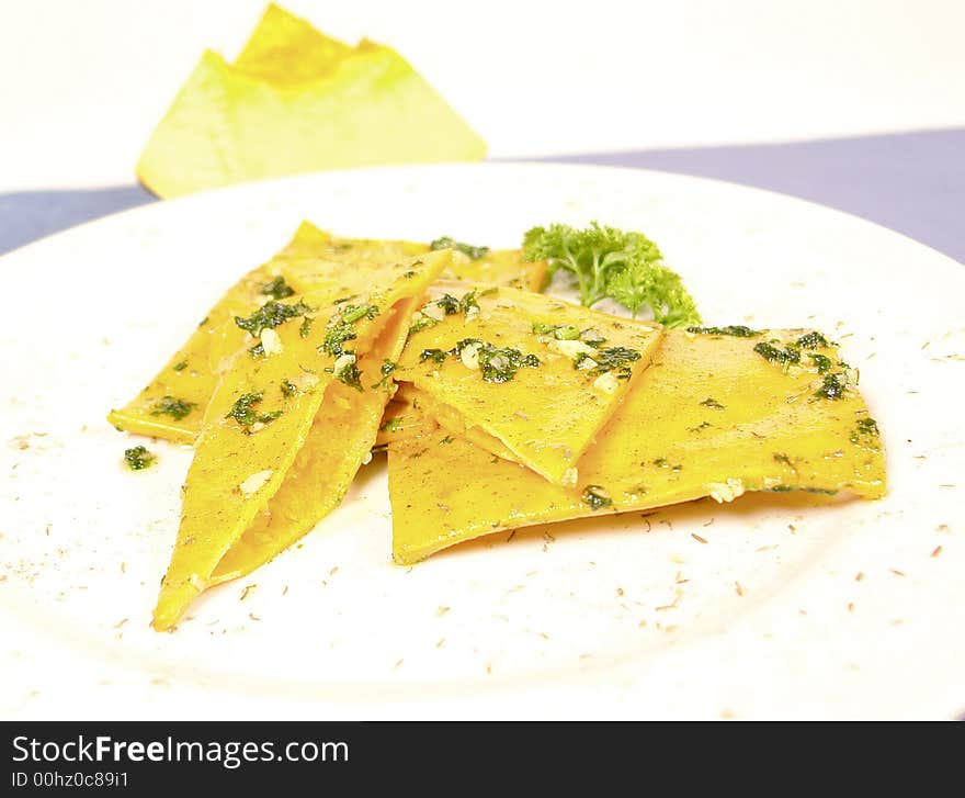 Homemade stuffed raviolis with squash filling