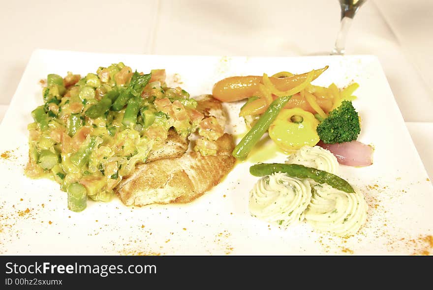 Fish fillet with vegetables and mashed potatoes