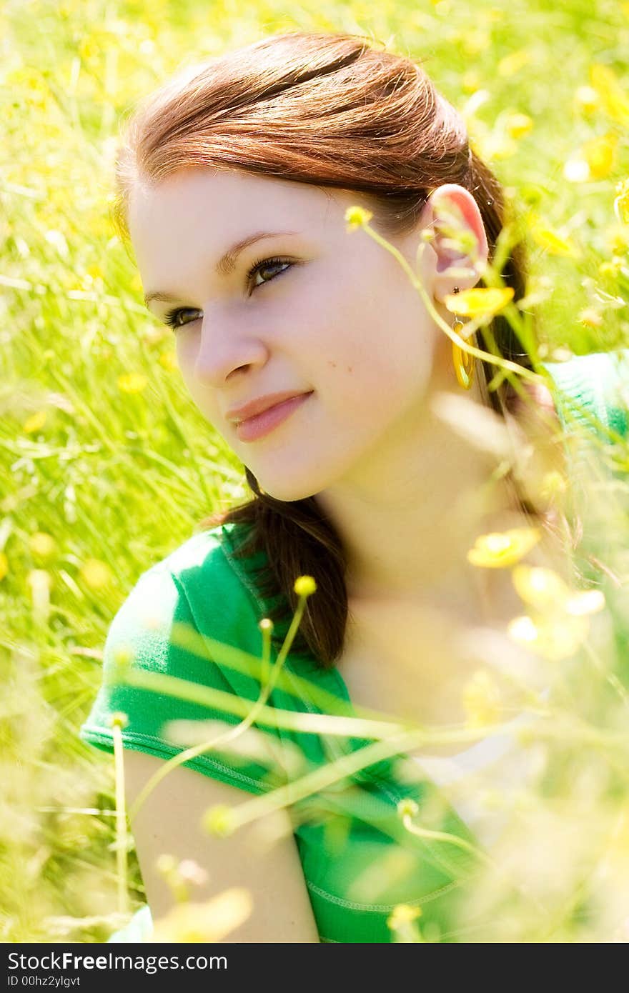 Portrait of a beautiful teen in a sunny field. Portrait of a beautiful teen in a sunny field.