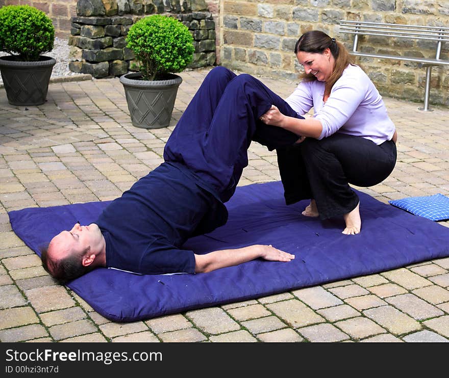 Shoulder stand position as part of a Thai body massage