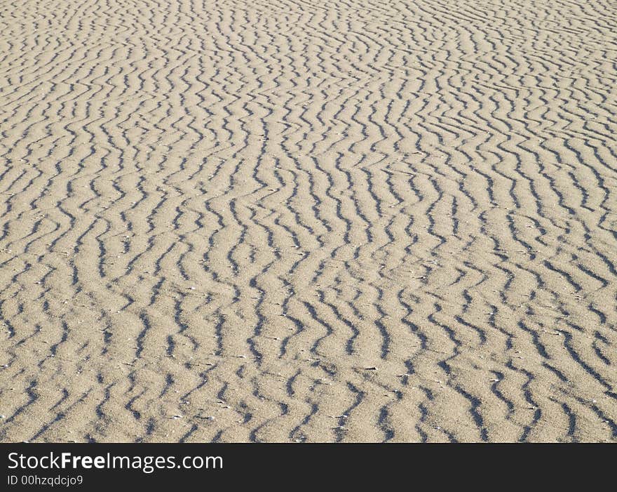 Patterns in the sand on the beach