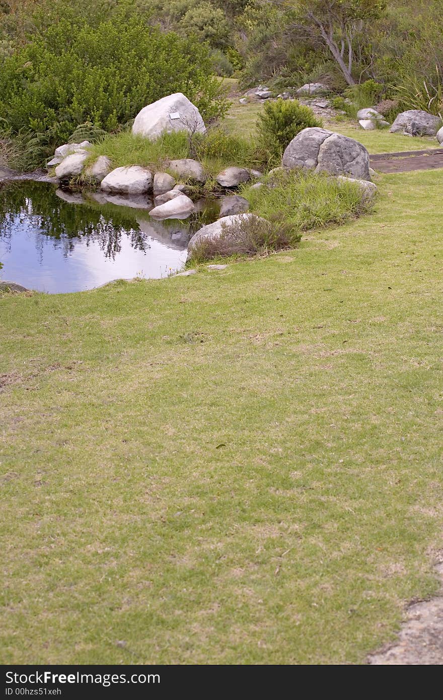 Garden and small lake by the golg course