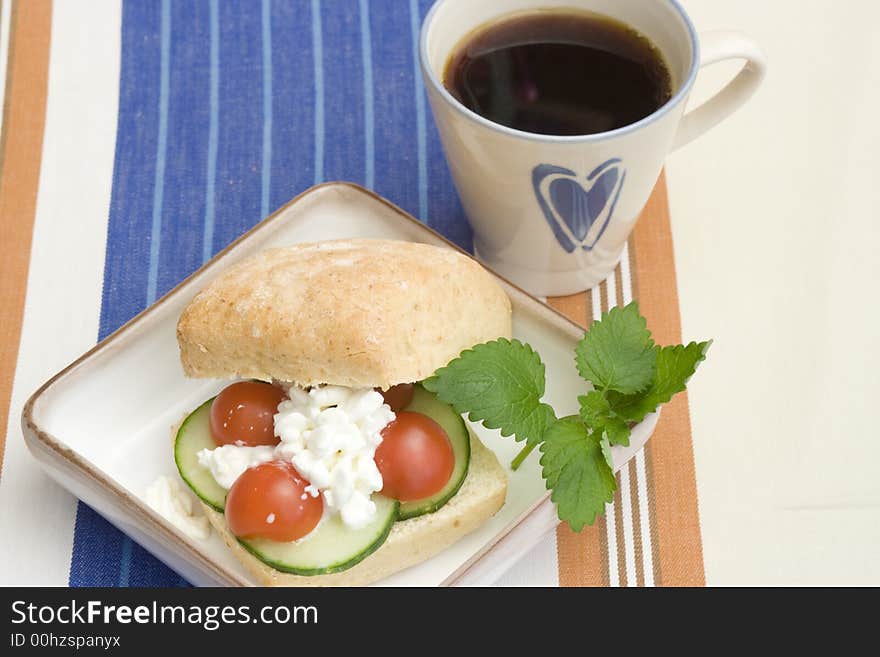 Breakfast bun and coffee