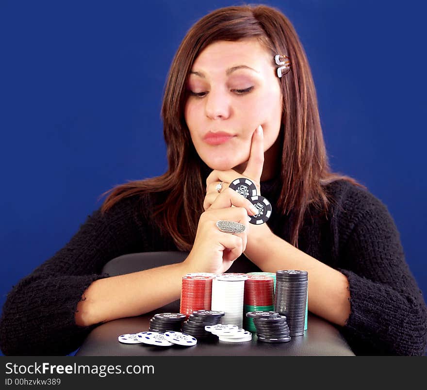 Girl counting her winnings in chips success