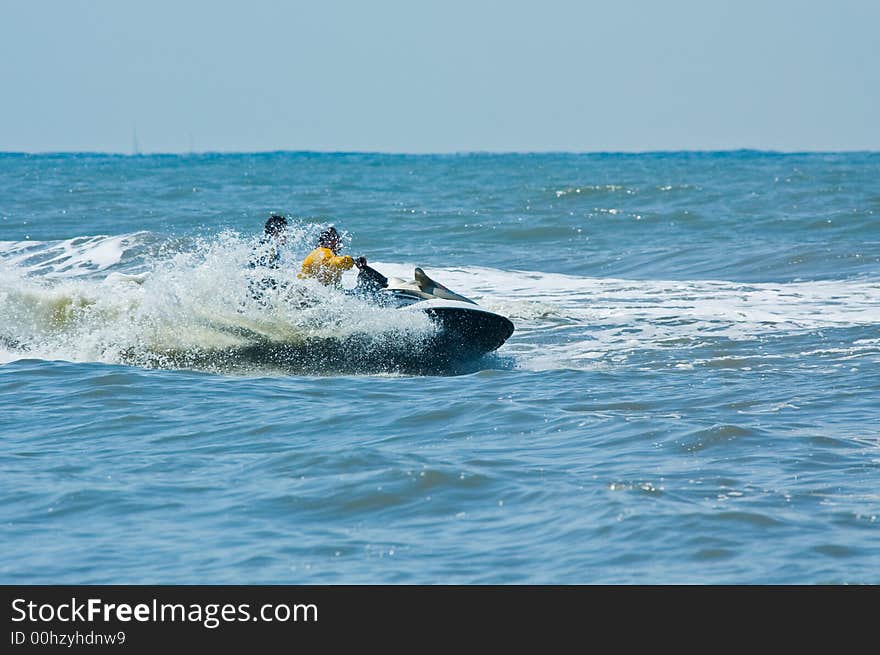 Extreme jet-ski watersports with big waves. Extreme jet-ski watersports with big waves