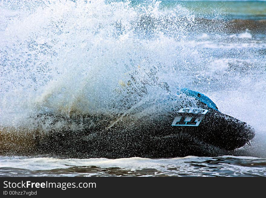 Extreme jet-ski watersports with big waves. Extreme jet-ski watersports with big waves