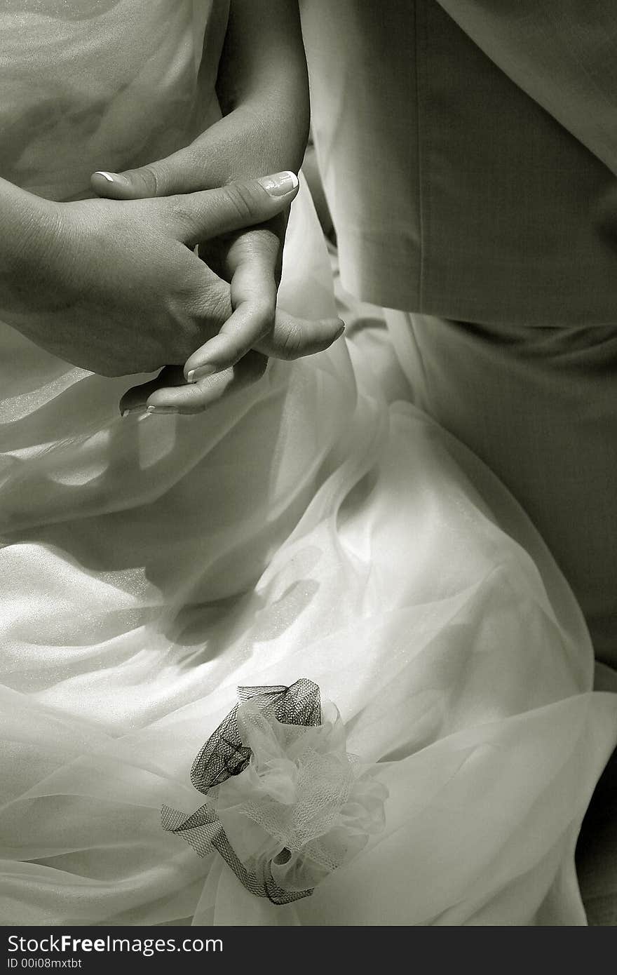 A real wedding, bride praying with hands clasped. A real wedding, bride praying with hands clasped