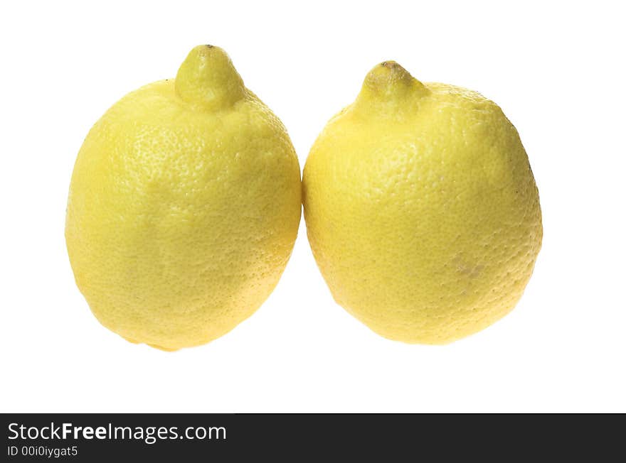 Two lemons on a white background