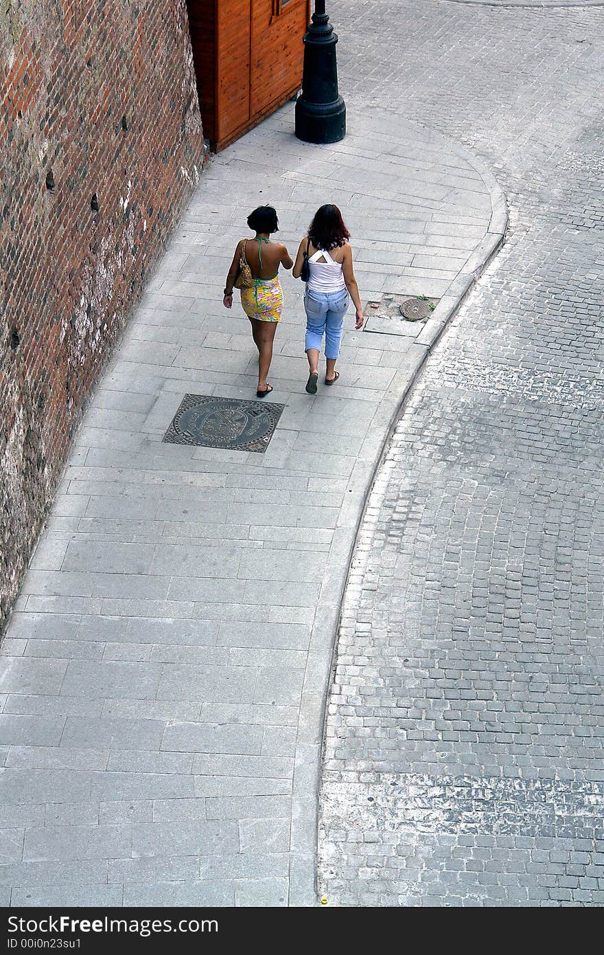 Two Young Ladies Walking