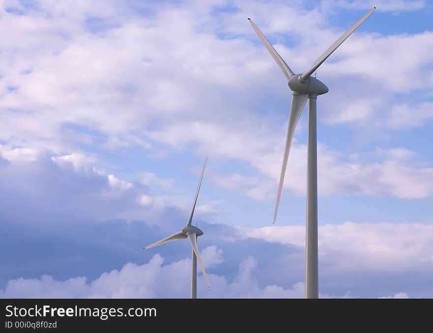 Wind turbines against a cloudy stormy sky