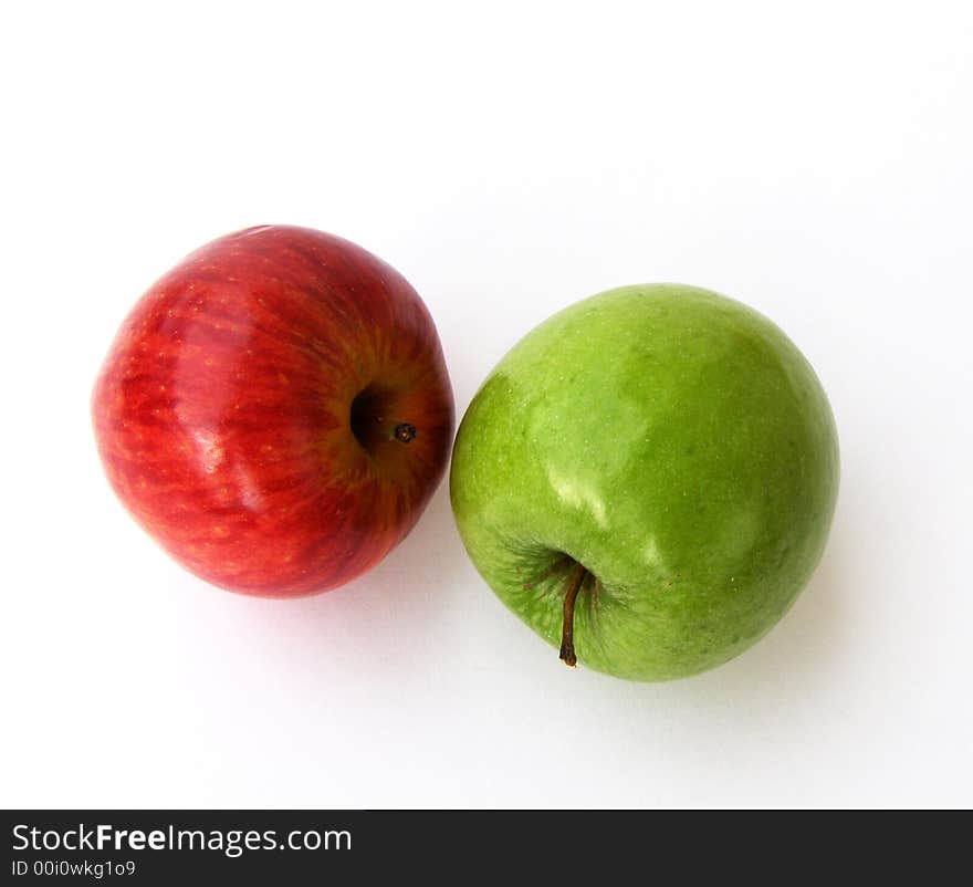 Green and red apples on a white background. Green and red apples on a white background.