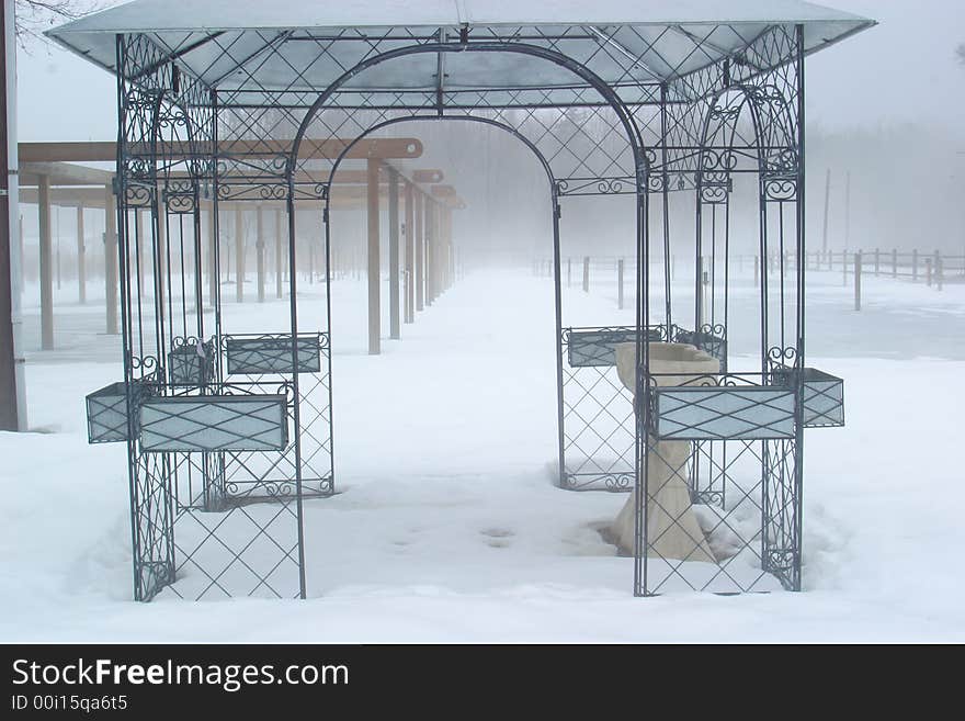 Looking through an arch on a foggy, snowy, morning, perspective & mystery. Looking through an arch on a foggy, snowy, morning, perspective & mystery