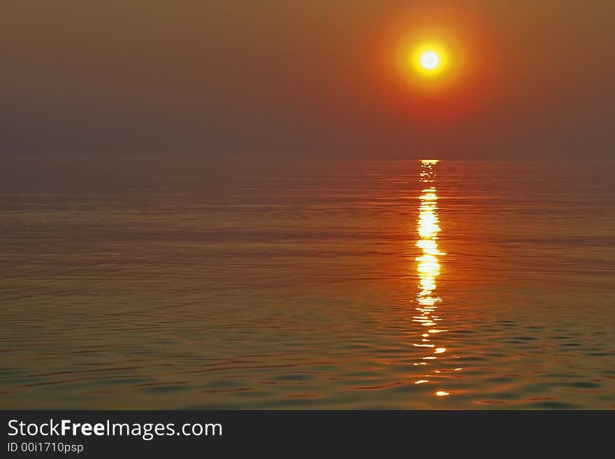 Sunset reflecting on the red sea. Sunset reflecting on the red sea