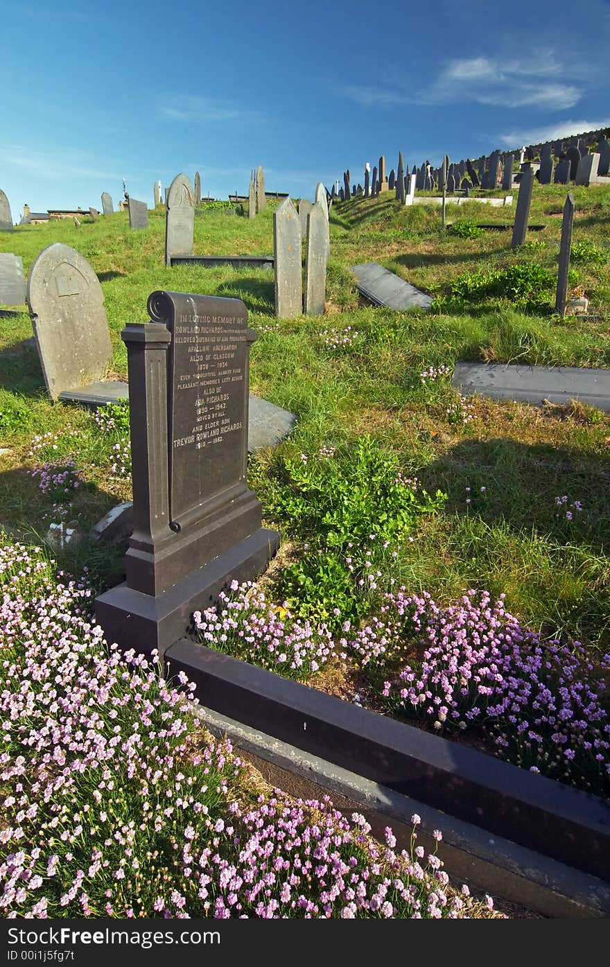 Aberdaron cemetery graves with flowers, Wales