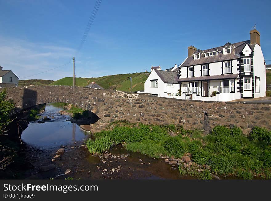 Aberdaron town, white house and bridge, Wales