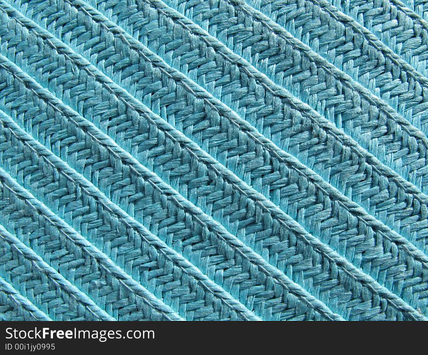 A closeup of a blue texture made of rope. A closeup of a blue texture made of rope