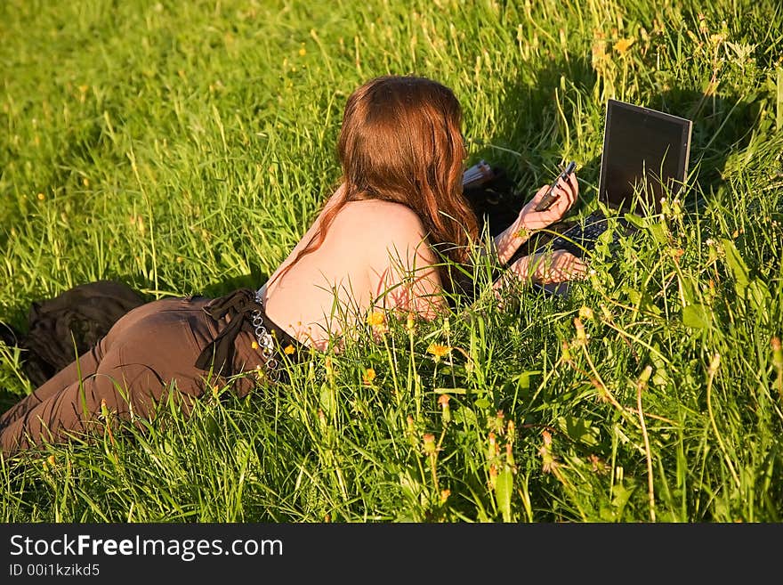 Girl,grass,laptop