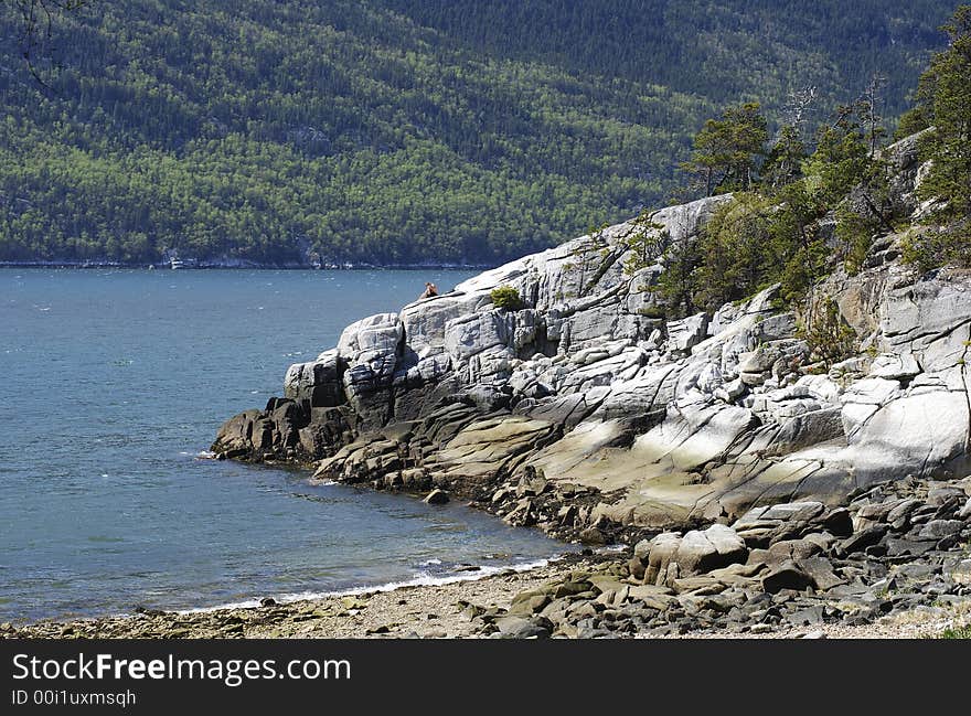 Small beach Smugglers Cove situated in Yakutania Point park (Skagway, Alaska)