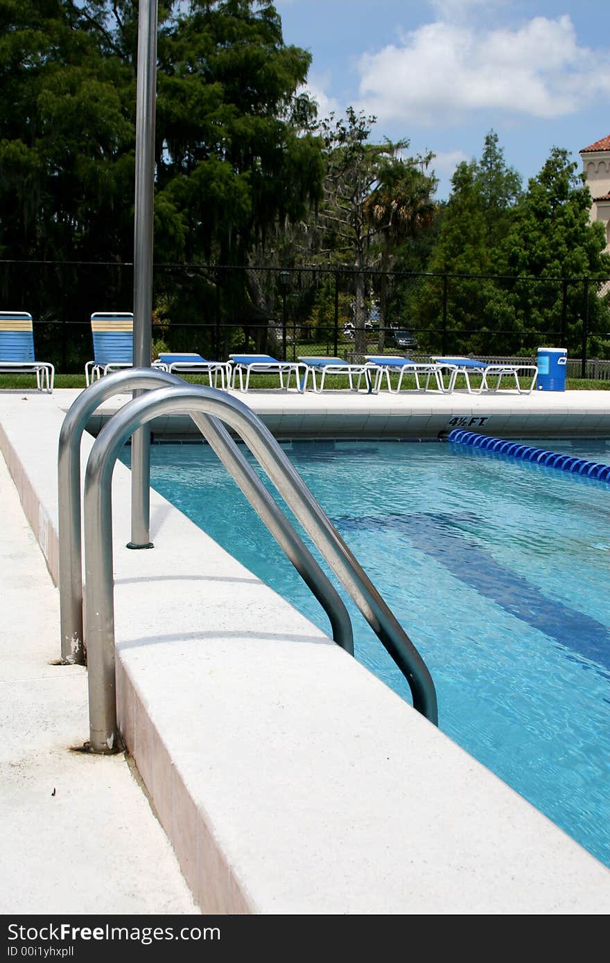 Ladder of a pool at a local college in Orlando, Florida. Ladder of a pool at a local college in Orlando, Florida