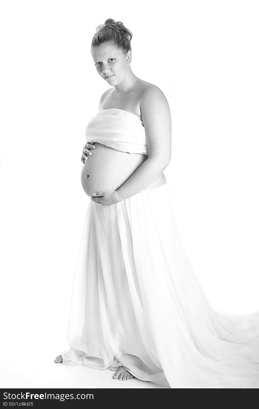 Beautiful pregnant woman looking at the camera. Beautiful pregnant woman looking at the camera.