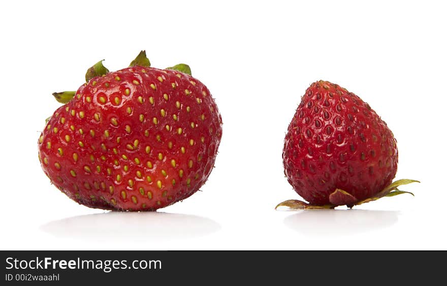 Colorful strawberries isolated over white background