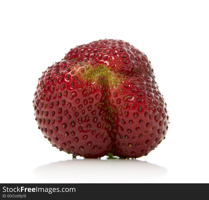 Close-up of a strawberry over white background