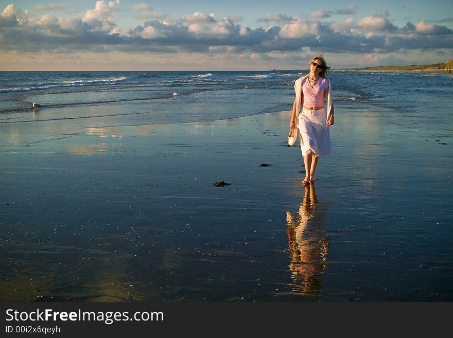 Attractive blond girl at the seaside. Attractive blond girl at the seaside