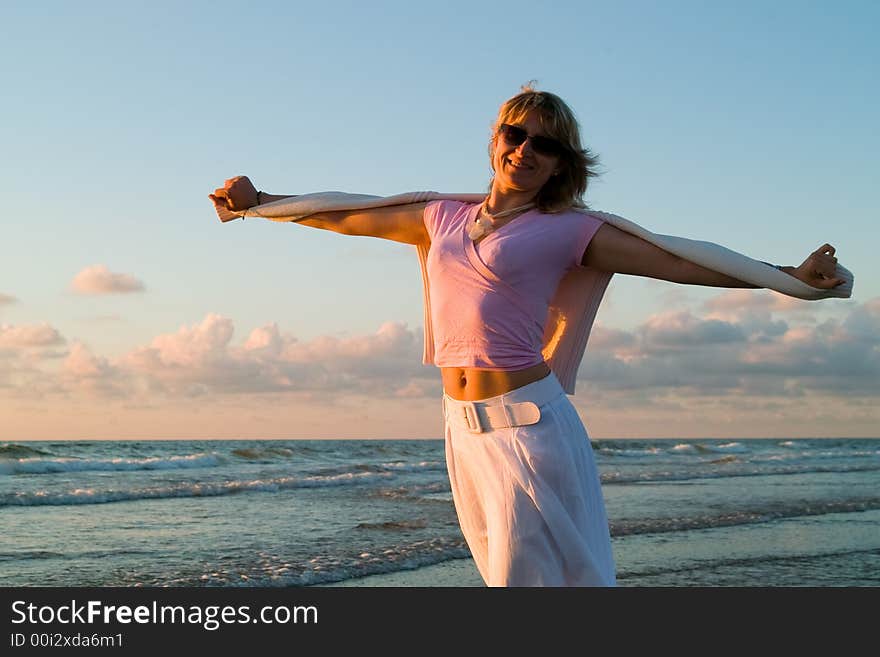 Attractive blond girl at the seaside. Attractive blond girl at the seaside