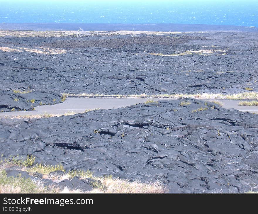 Lava Trail in the Kilauea Volcano located on the Big Island of Hawaii.  The volcano is still active.  This was the old Crater road, until it was covered by lava in the 1980's. Lava Trail in the Kilauea Volcano located on the Big Island of Hawaii.  The volcano is still active.  This was the old Crater road, until it was covered by lava in the 1980's.