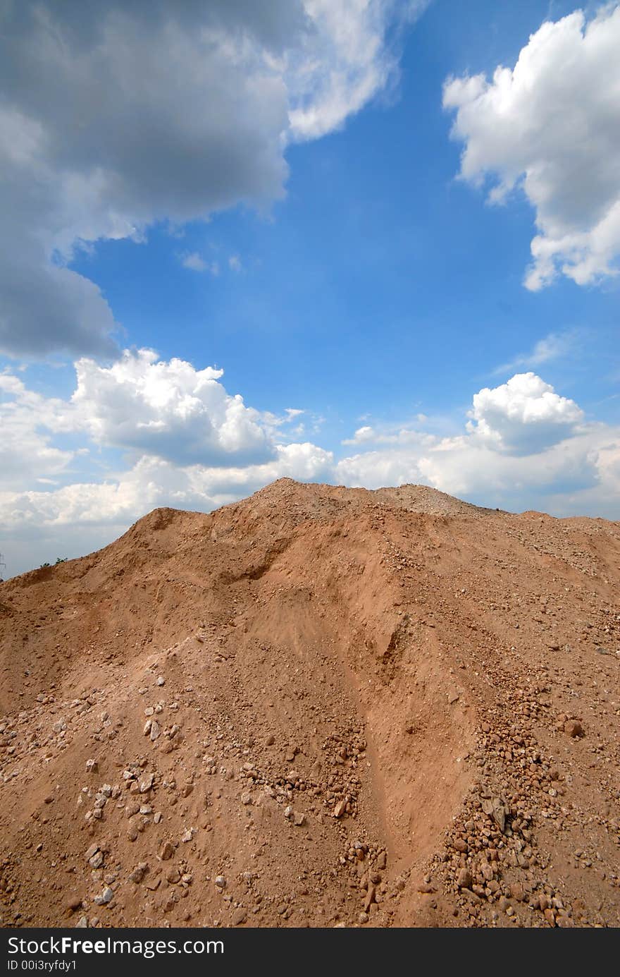 Sand embankment on background of  sky. Sand embankment on background of  sky