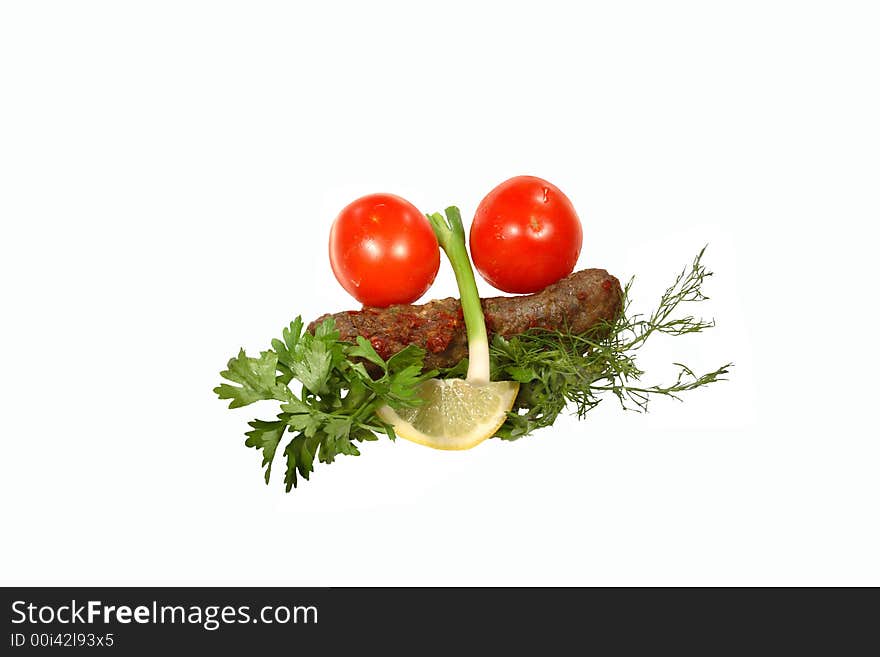 Kebab, tomatoes, onion, parsley and lemon on a white background. Kebab, tomatoes, onion, parsley and lemon on a white background