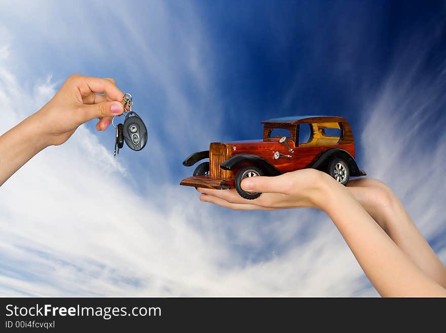 The machine and keys on a background of the sky