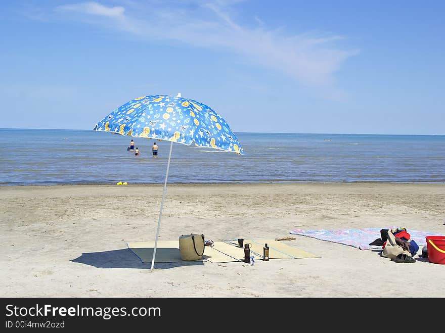 Photo of a beach with umbrella