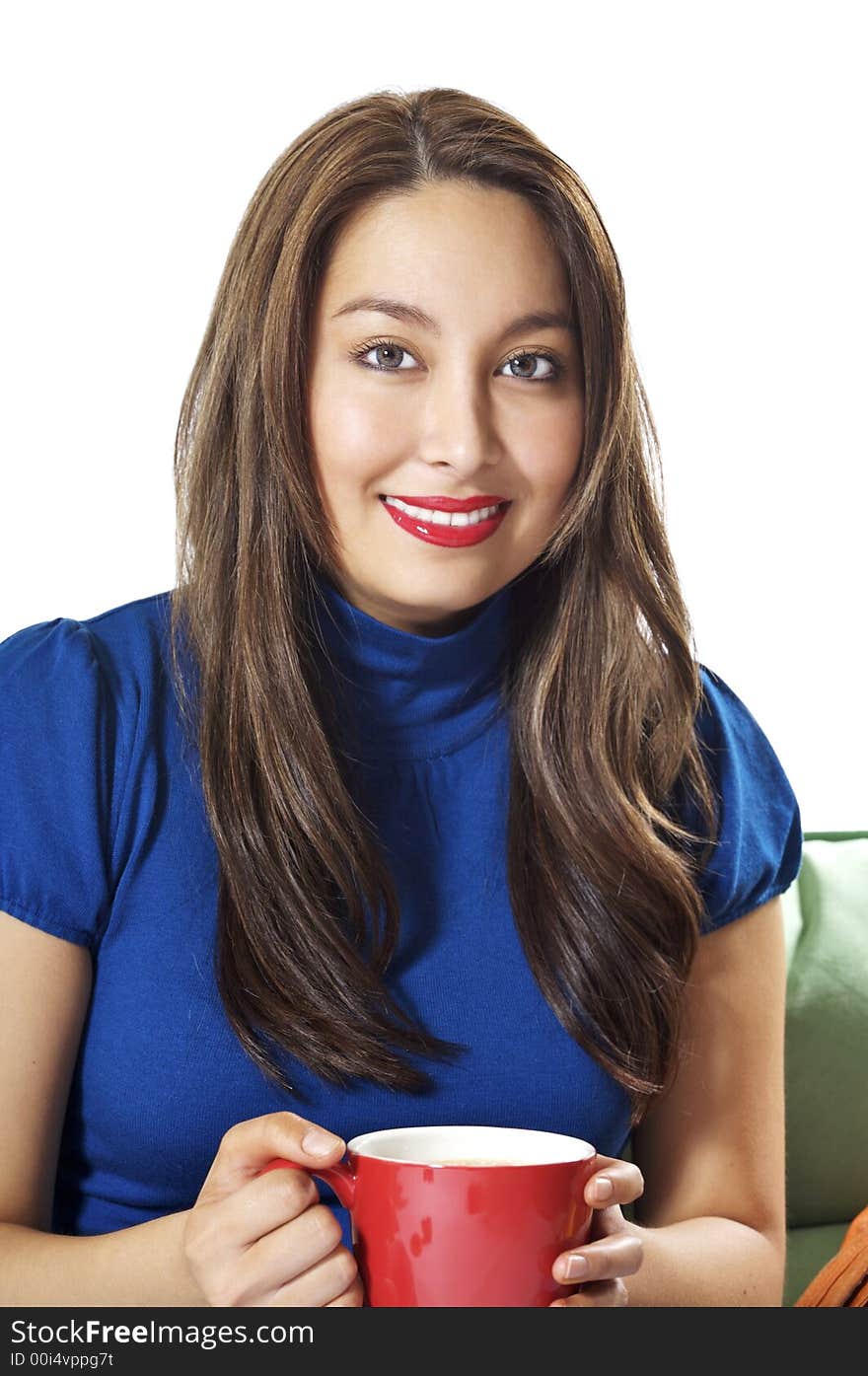 Pretty Asian Hispanic Women enjoying her morning cup of coffee. Pretty Asian Hispanic Women enjoying her morning cup of coffee