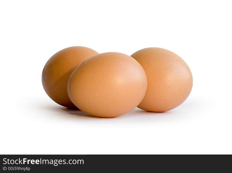 Three eggs on white background