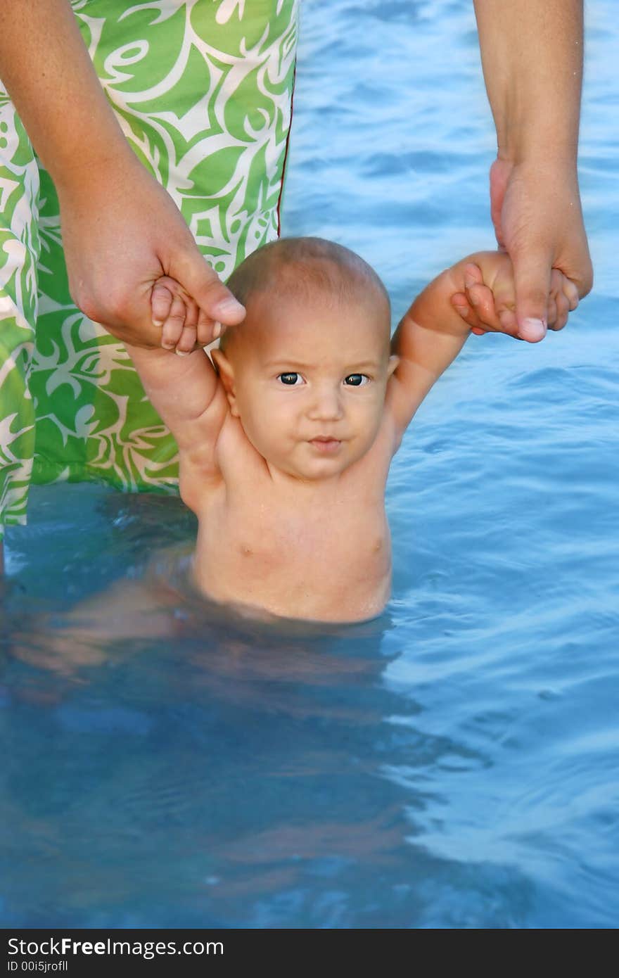 Father teaching his son to swim. Father teaching his son to swim